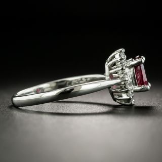 Estate .63 Carat Ruby and Diamond Halo Ring