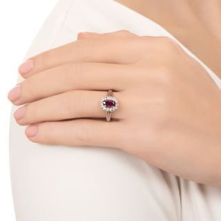 Estate .80 Carat Ruby and Diamond Platinum Halo Ring