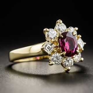Estate .82 Carat Ruby and Diamond Halo Ring