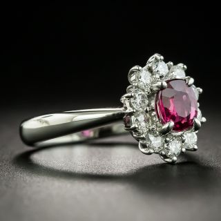 Estate .87 Carat Ruby and Diamond Halo Ring