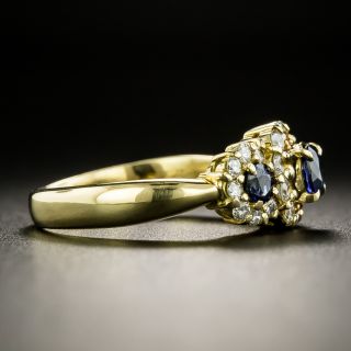 Estate Three-Stone Sapphire and Diamond Halo Ring