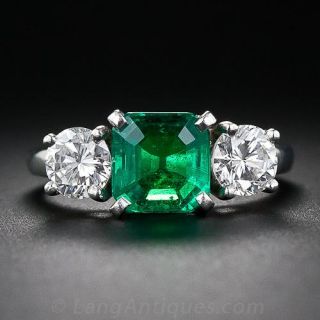 Fine Emerald and Diamond Three-Stone Ring