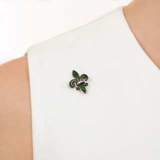 Fleur de Lys Enamel and Diamond Brooch by Riker Bros. 