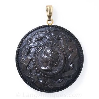 Gutta Percha Cameo Carved Pendant
