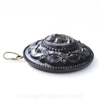 Gutta Percha Cameo Carved Pendant