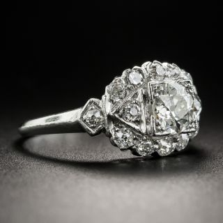 Late-Art Deco .50 Carat Diamond Platinum Engagement Ring by J and H Flyer