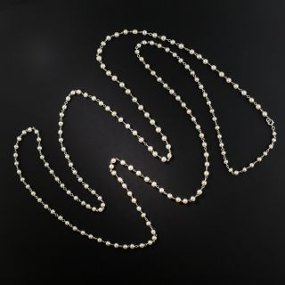Long Edwardian Natural Pearl and Platinum Chain