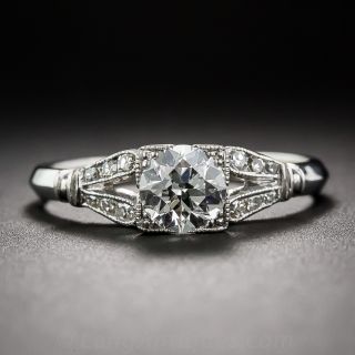 Mid-Century Platinum Engagement Ring Featuring Antique Diamond