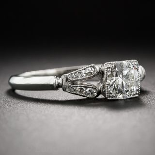 Mid-Century Platinum Engagement Ring Featuring Antique Diamond