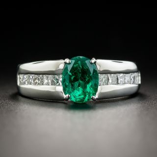 Modern 1.01 Carat Emerald Platinum Diamond Ring