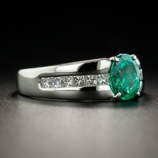 Modern 1.01 Carat Emerald Platinum Diamond Ring