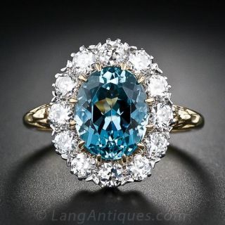 Oval Aquamarine and Diamond Halo Ring