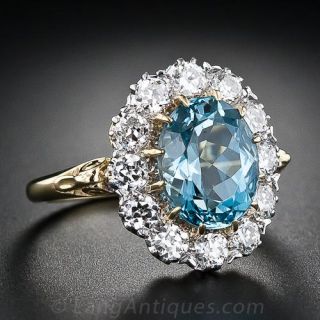 Oval Aquamarine and Diamond Halo Ring