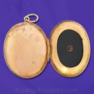 Oval Locket with Flower Basket Motif
