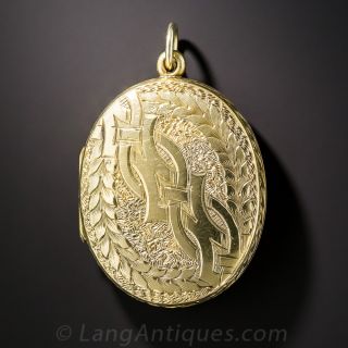 Oval Puffed Locket with Diagonal Celtic Braid