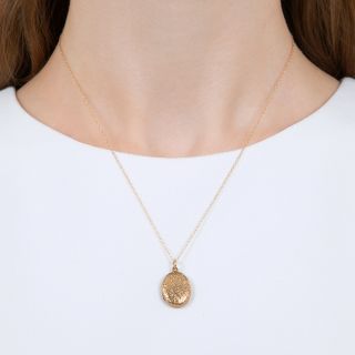 Petite English Victorian Engraved Oval Locket