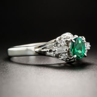 Platinum .35 Carat Oval Emerald and Diamond Ring