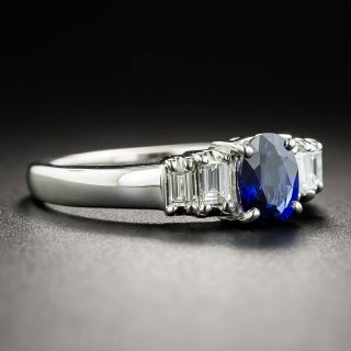 Platinum .71 Carat Sapphire and Baguette Diamond Ring