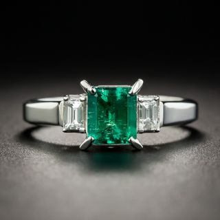 Platinum .81 Carat Emerald and Diamond Ring