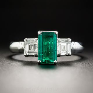 Platinum .83 Carat Emerald and Diamond Ring