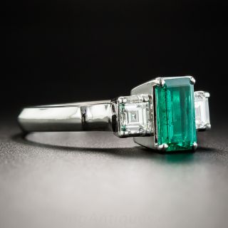 Platinum .83 Carat Emerald and Diamond Ring