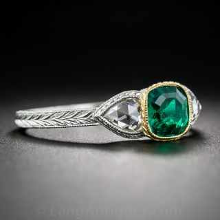 Platinum and 22K Gold Emerald and Diamond Ring