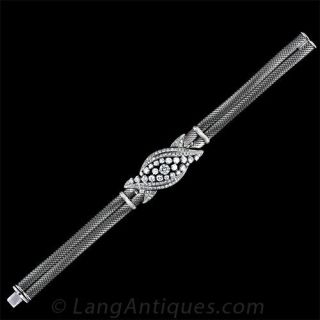 Platinum and White Gold Bracelet and Brooch