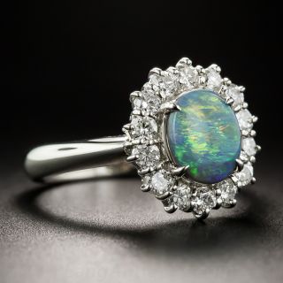 Platinum Black Opal and Diamond Halo Ring