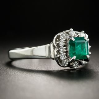 Scrolled Platinum Emerald and Diamond Ring