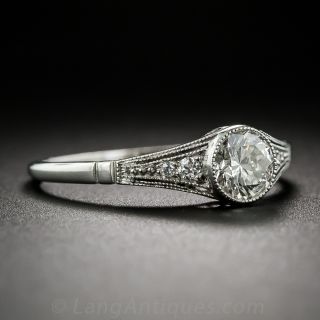 Sleek Platinum and Diamond Art Deco Engagement Ring