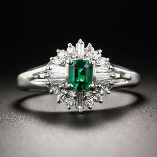 Small Platinum Emerald and Diamond Halo Ring