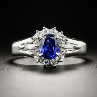 Small Platinum Sapphire and Diamond Halo Ring
