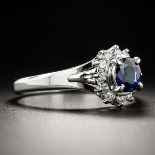 Small Platinum Sapphire Diamond Halo Ring