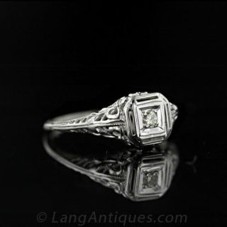 Small Scale .05 Carat Diamond Ring