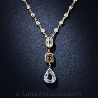 Three Diamond Pendant Necklace