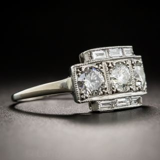 Three-Stone Diamond and Baguette Diamond Ring