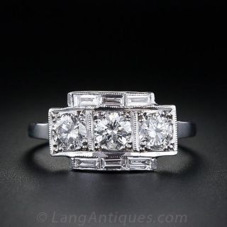 Three-Stone Diamond and Baguette Diamond Ring