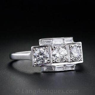 Three-Stone Diamond and Baguette Diamond Ring