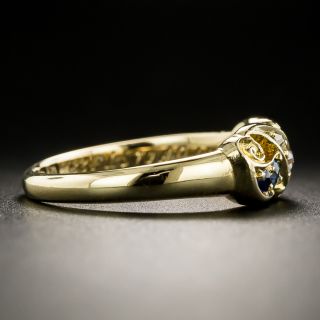 Early 20th Century Diamond and Sapphire Swirl Ring