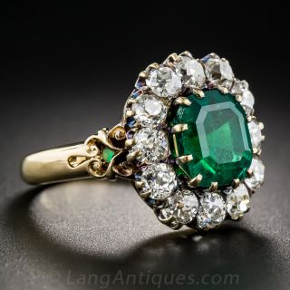 Vintage 2.75 Carat Emerald and Diamond Halo Ring