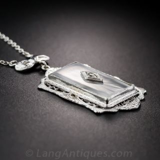 Vintage Carved Rock Quartz and Diamond Pendant