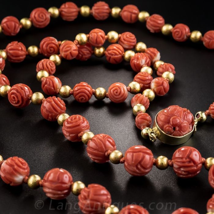 Carved red coral beads discount