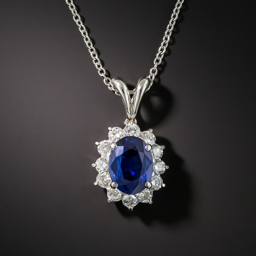 Estate Platinum Sapphire and Diamond Halo Pendant Necklace