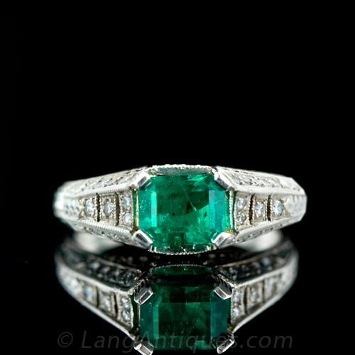 Emerald and Platinum Diamond Ring