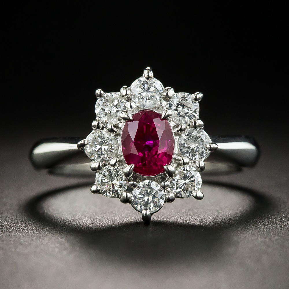 Estate .66 Carat Ruby Platinum Diamond Halo Ring
