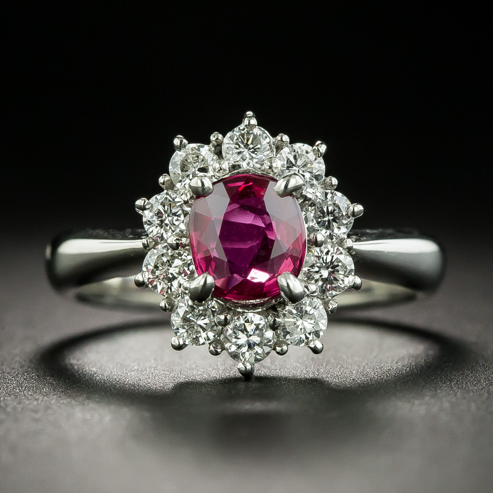 Estate .87 Carat Ruby and Diamond Halo Ring