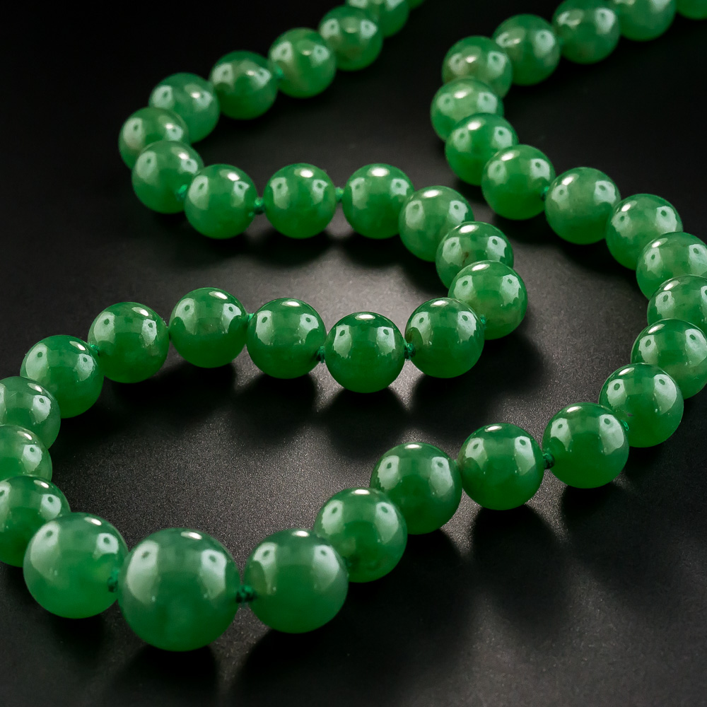 Expertly Carved Deep Green Jade Beads with Gold Clasp