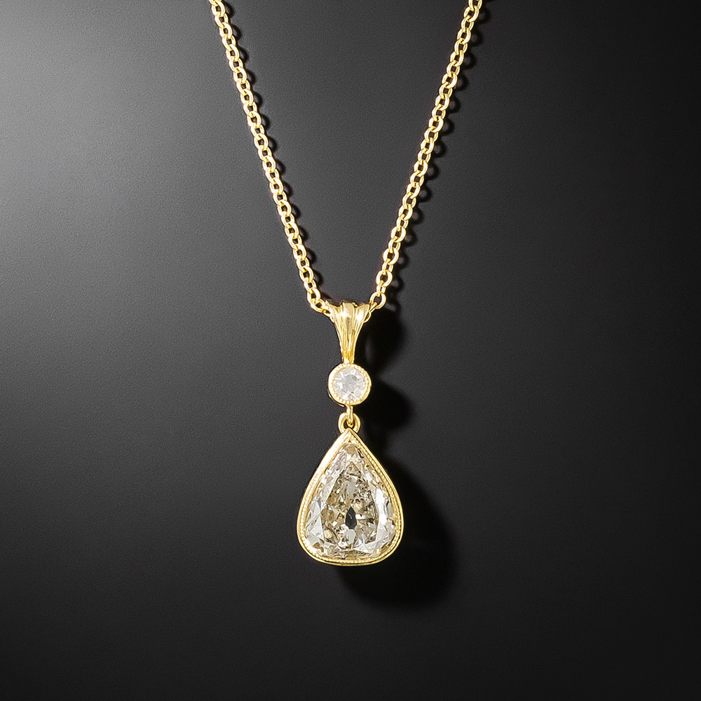 Tanzanite & diamond pear shaped pendant in 18ct white gold, 1355