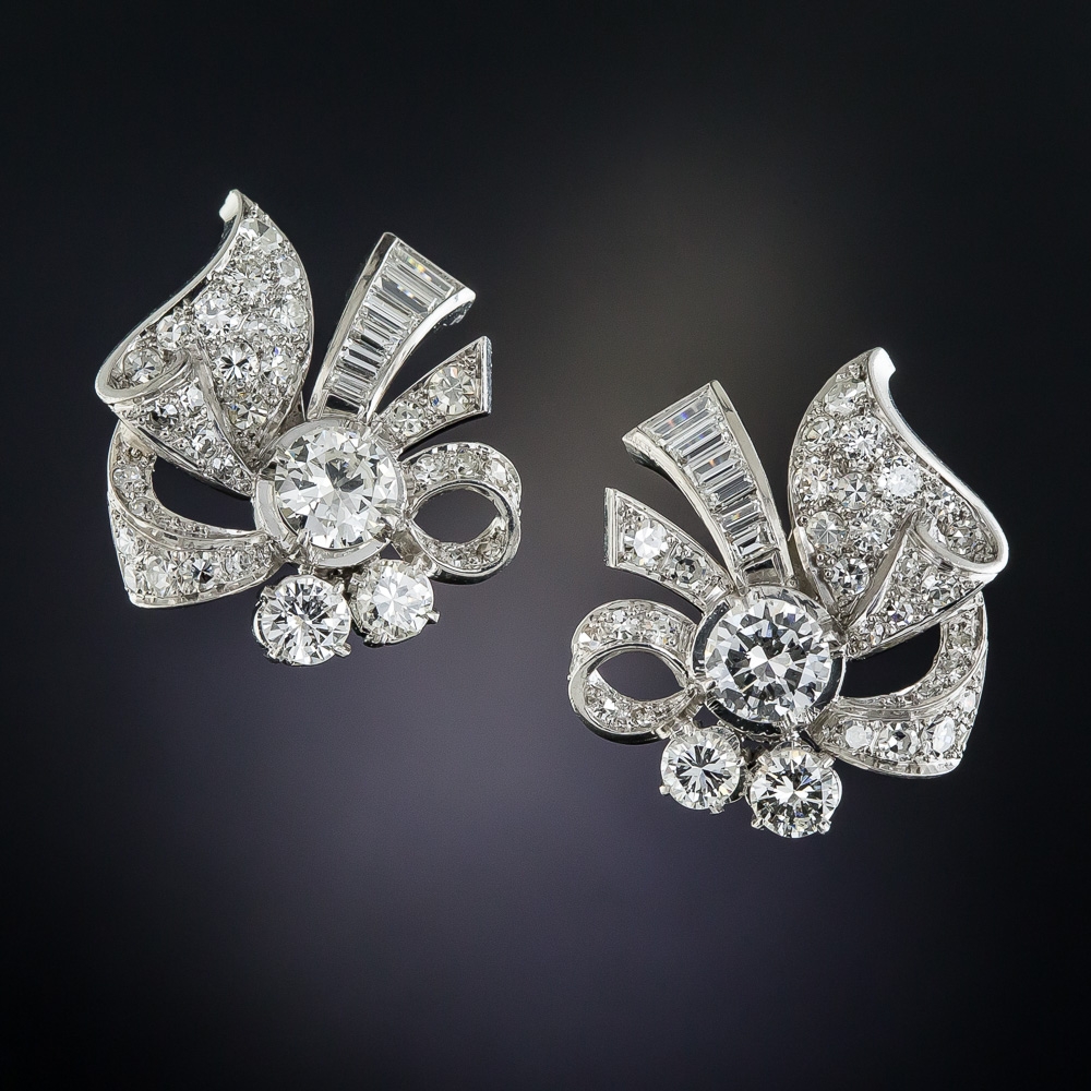 Mid-Century Platinum Diamond Bow Earrings.