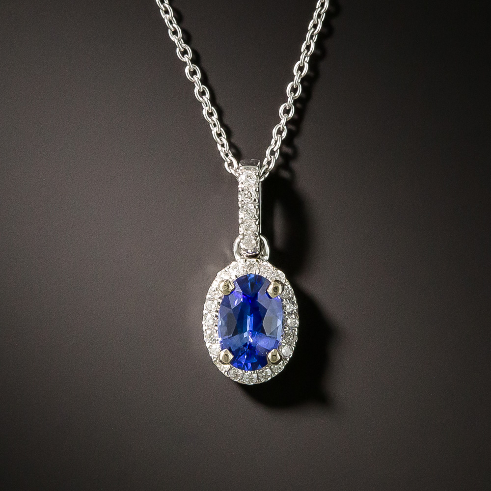 Petite Oval .45 Carat Sapphire and Diamond Halo Pendant